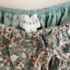 Ditsy floral print mini dress with smocked waistband and puff sleeve detailing.